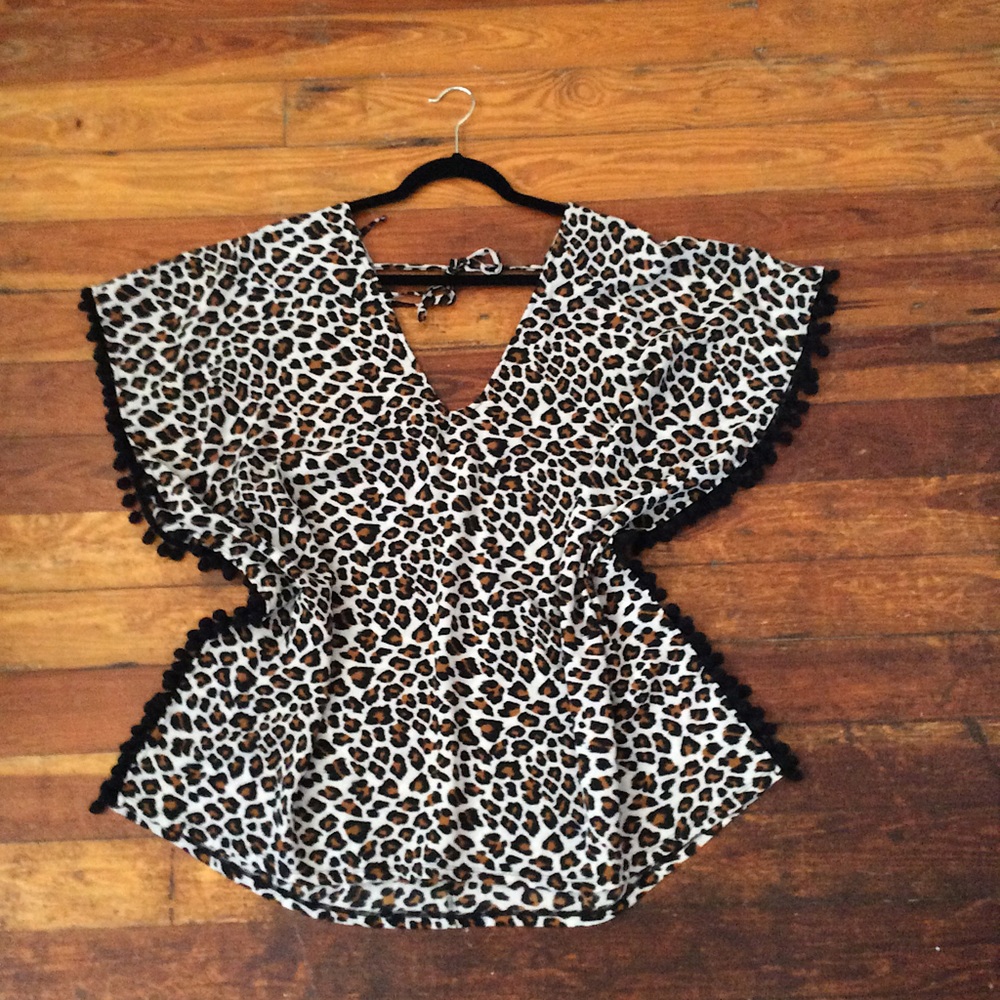 Swimsuit coverup/ blouse.